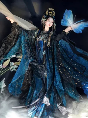 Full-body front three-quarter view of a woman wearing a Jade Bone Tang Dynasty Hanfu Qixiong Ruqun with black to peacock blue ombre fabric, gold sparkle details, turquoise embroidery, and flowing wide sleeves