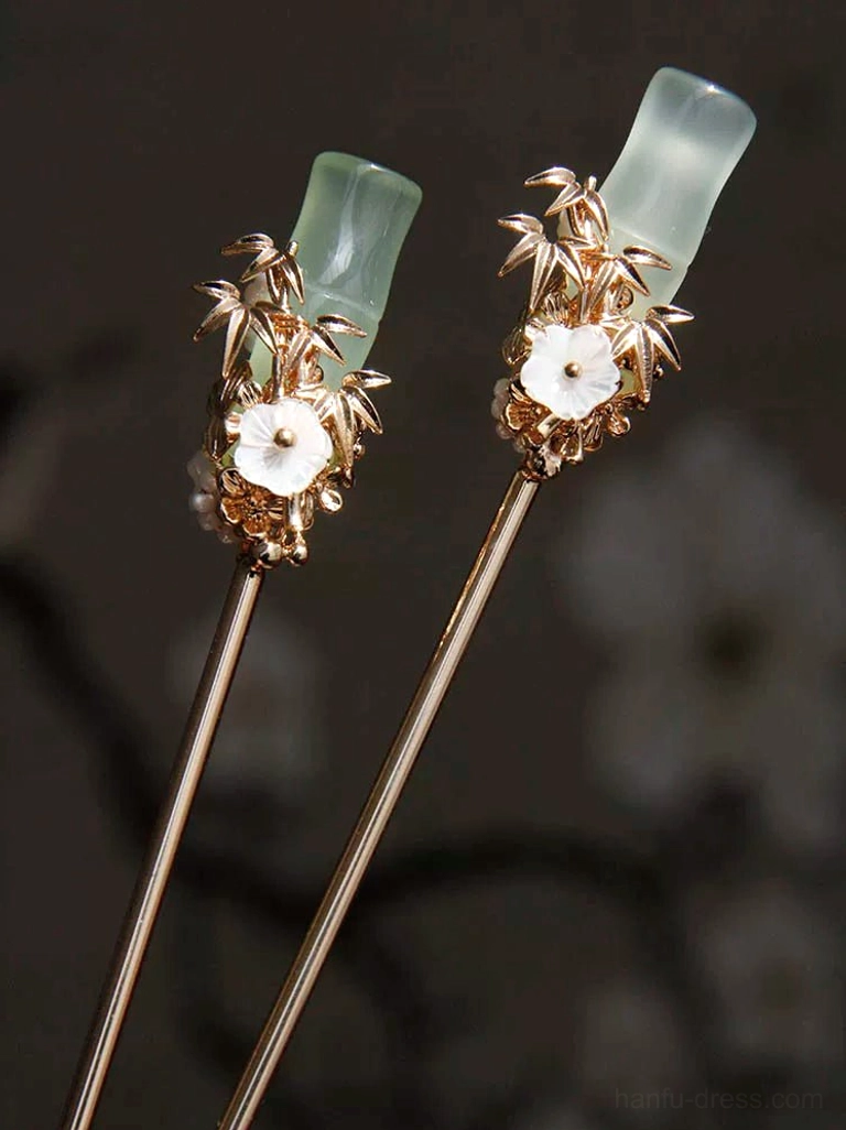 Jade green bamboo Chinese hair sticks with white flower ornaments and delicate pearl cluster accents