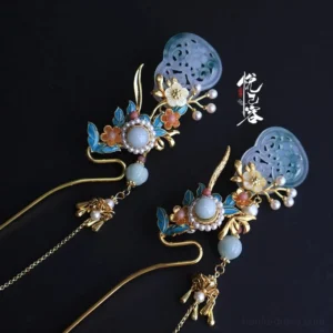 Pair of matching Chinese Hanfu bùyáo hairpins with blue-green carved ornaments, orange flowers, pearl-like beads and dangling deer charms