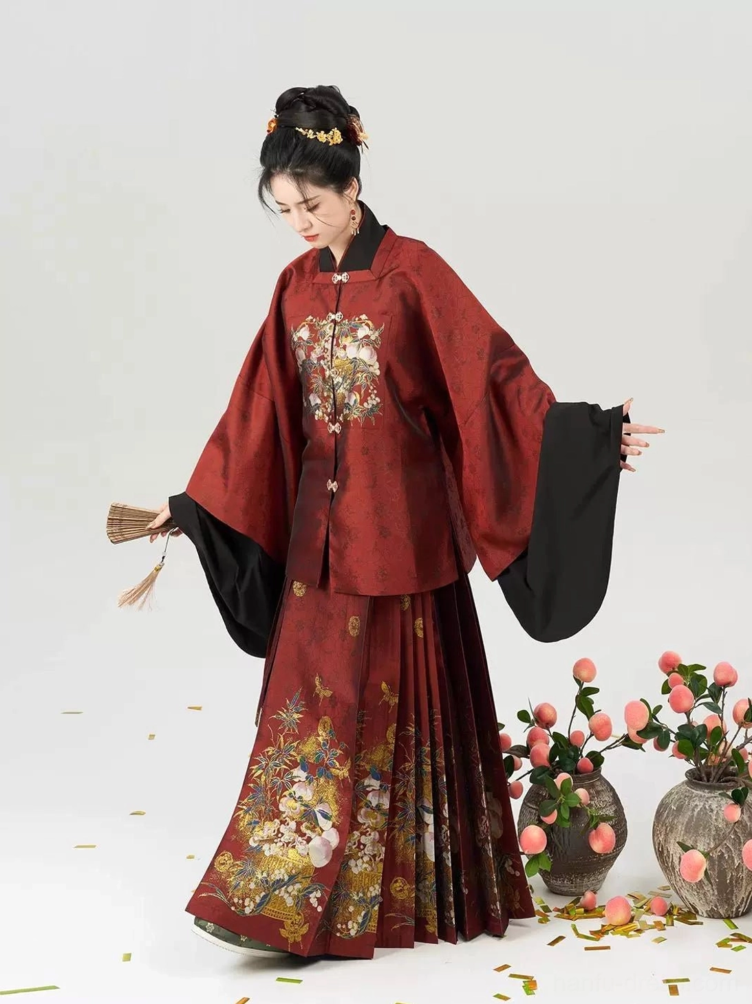 Jade Peach Spirit Chinese New Year Hanfu outfit with wide pipa sleeves embroidered peach motif and black printed mamian skirt