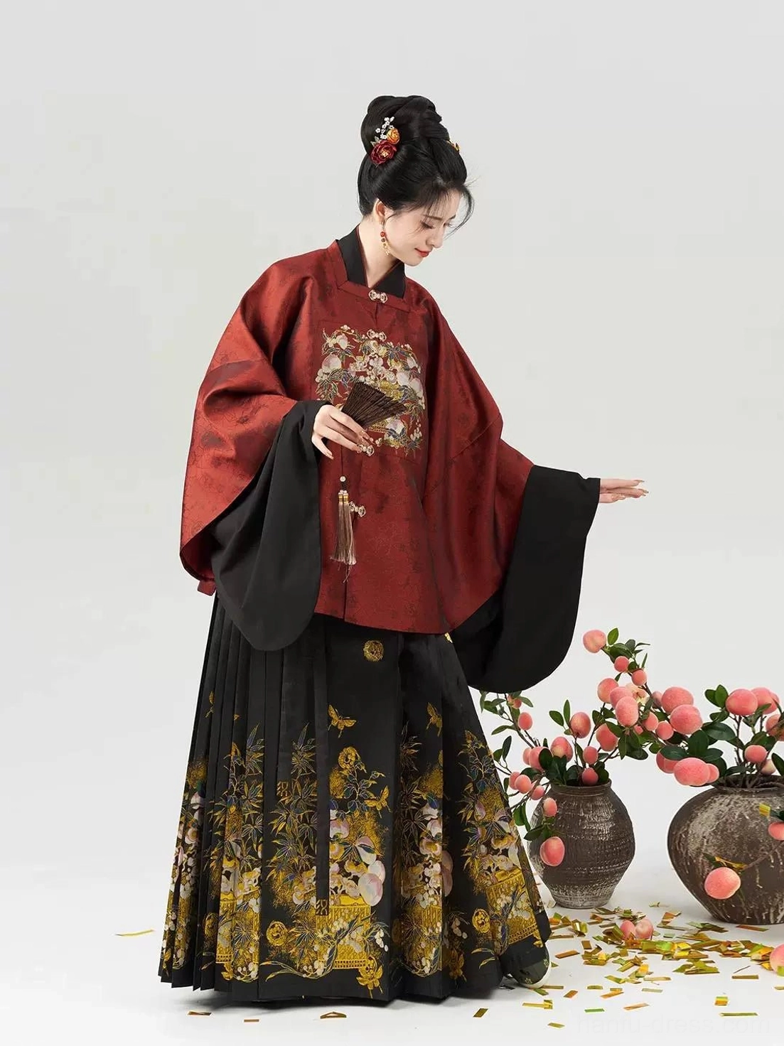 Ming Dynasty inspired Chinese New Year Hanfu set showing traditional square collar layered top and flowing mamian skirt side view