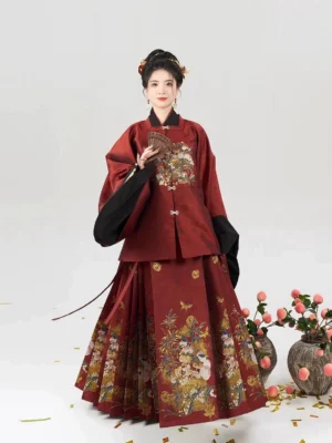Jade Peach Spirit Ming style Chinese New Year Hanfu set with wine red square collar top black sleeves and printed mamian skirt front view