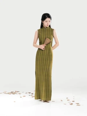 Olive green sleeveless striped cheongsam dress with stand collar and bamboo fan, full length front view