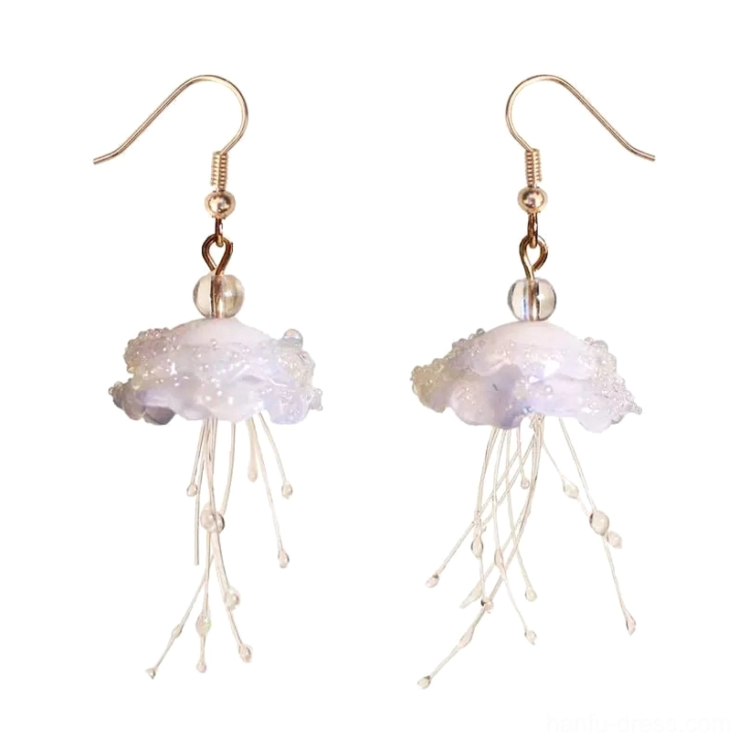 Jellyfish drop earrings with gold hooks clear round spacer beads and matte iridescent white pendants photographed on a clean white background