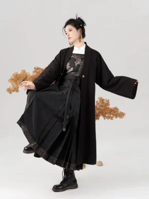 Jinwu modern Ming Dynasty Hanfu outfit styled with black outer robe, Golden Crow vest, mamianqun skirt and combat boots