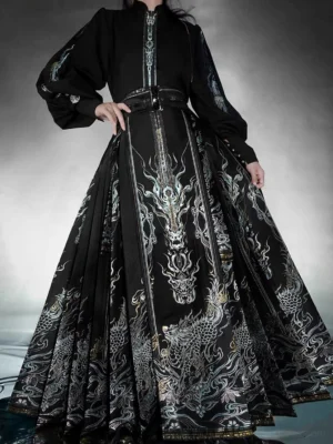 Close-up of King Lanling modern Chinese Hanfu set showing stand collar embroidery, pleated black mamianqun horse face skirt, and matching wide waist belt