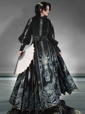 King Lanling modern Hanfu outfit side view with black stand-collar top, embroidered blue and gold mamianqun horse face skirt, wide waist belt, and folding fan