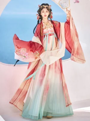 Koi Goldfish Princess Tang style Hanfu heziqun complete set shown from the front with floral embroidered sleeves and traditional round mirror prop