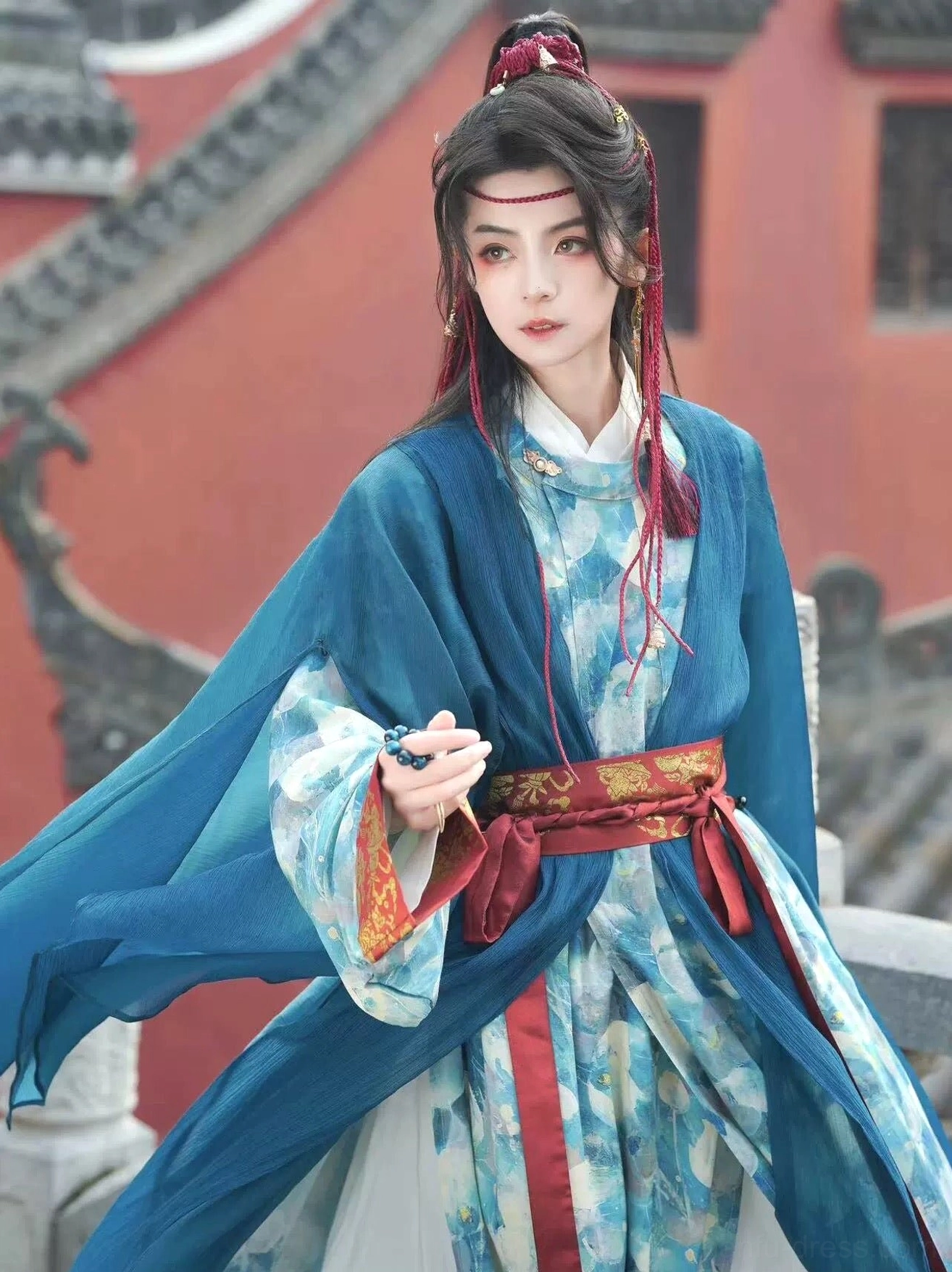 Lake blue Wei Jin inspired Hanfu costume for men with woven belt, cloud collar, layered skirt, and wide flowing outer robe