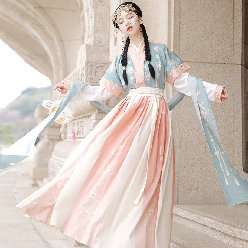 Lantern Fate Green Tang Dynasty Hanfu qiyao ruqun set with teal half-sleeve layer pink cream skirt and flowing sash side three-quarter view