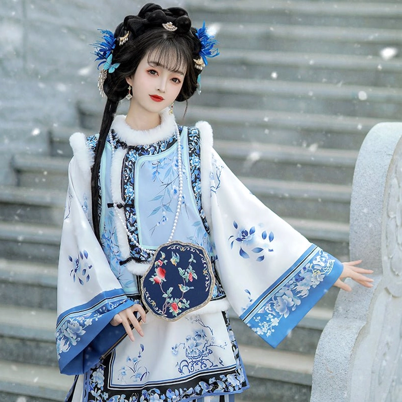 Blue and white porcelain themed Late Qing Han women winter vest with floral embroidery plush collar and sleeve trim plus matching embroidered handbag