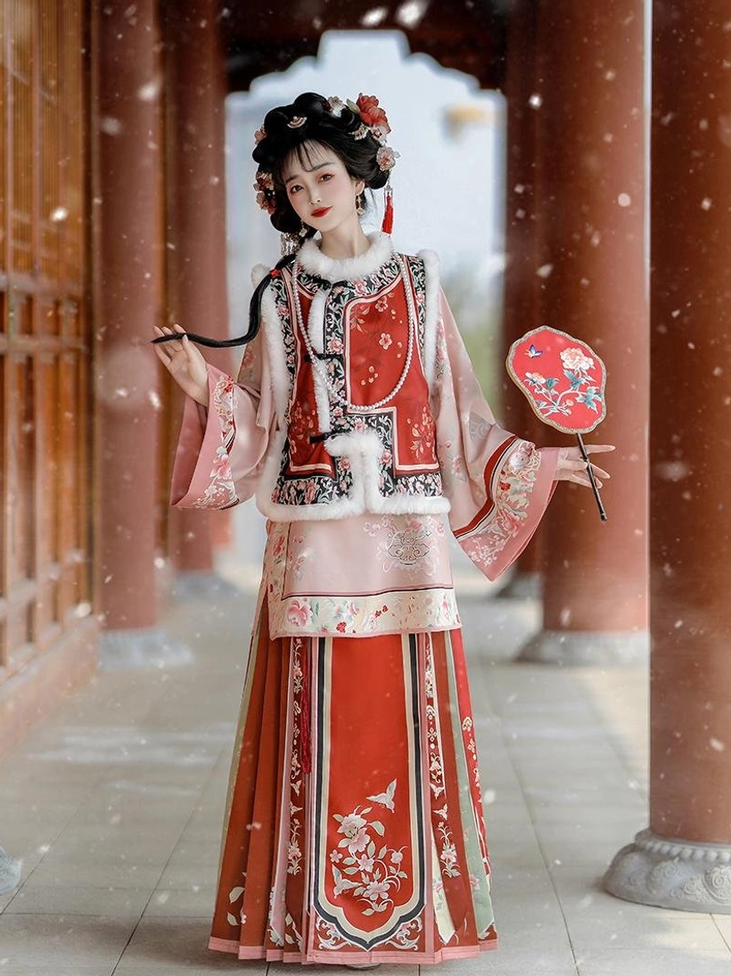 Pink and red Late Qing Dynasty Han women layered winter clothing with floral embroidered waistcoat wrap skirt plush trim and round silk fan
