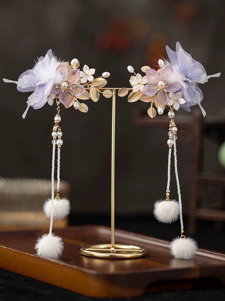 Pair of lavender floral Hanfu side hair clips with gold-tone leaf details, pearl chain tassels and white pom-pom pendants