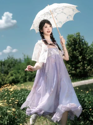 Three-quarter view of a flowing lavender modern Hanfu outfit with chiffon skirt, lace bolero, braided hair styling, and vintage lace parasol