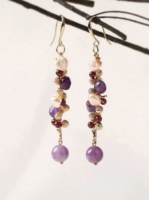 Lavender pearl cluster drop Chinese earrings with purple beads red accents gold hooks and round violet dangling drops