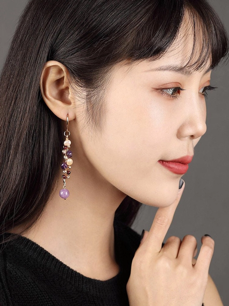 Side profile of model wearing elegant lavender pearl drop earrings for Hanfu Qipao and Cheongsam styling