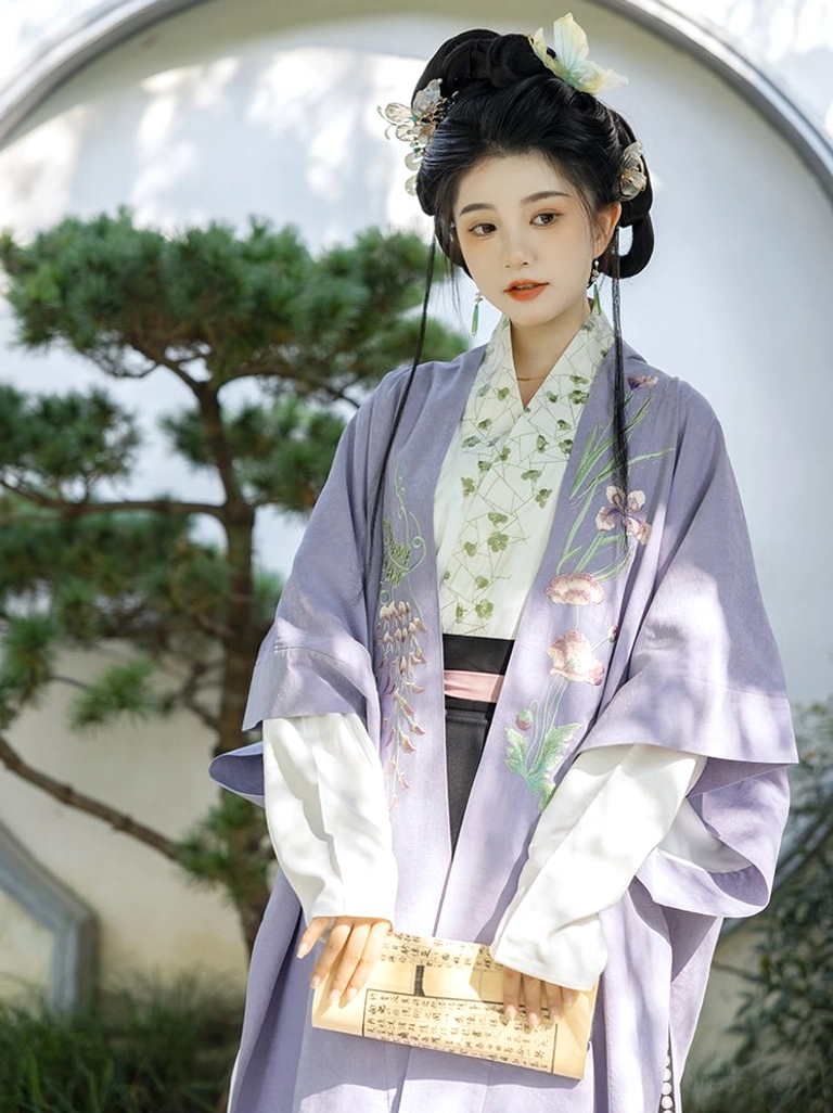 Woman wearing lavender Song Dynasty Hanfu beizi with floral embroidery pink waist sash and black botanical hem pleated skirt