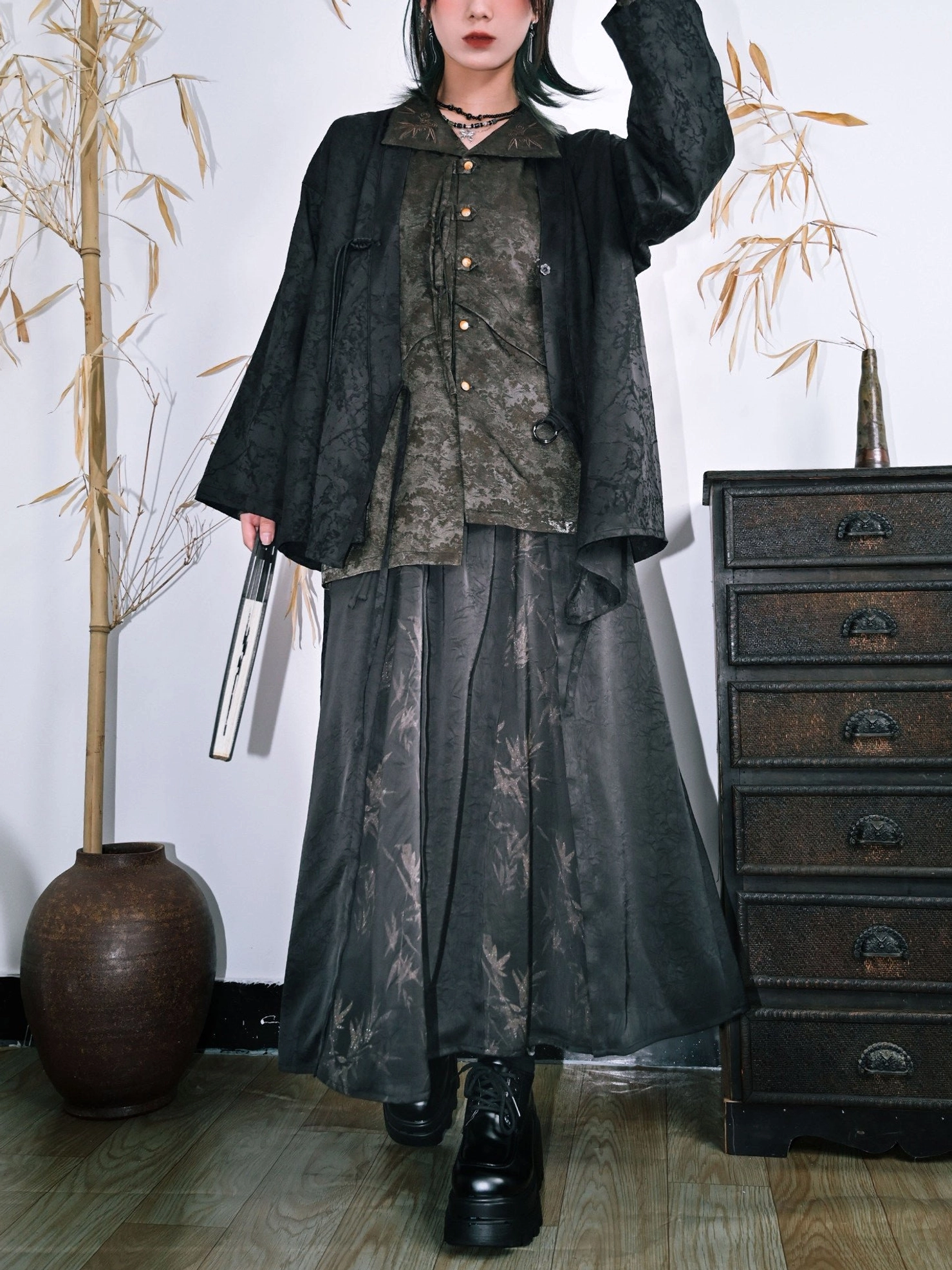 Layered New Chinese Style outfit featuring a dark bamboo print maxi skirt, jacquard jacket, printed top, and platform boots