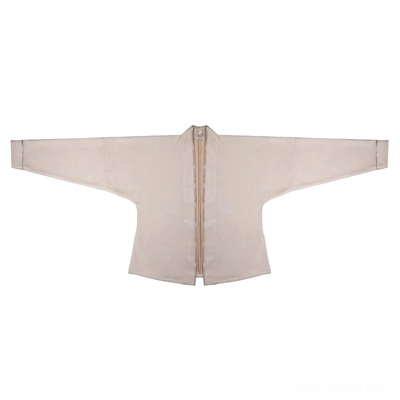 Flat lay of a light beige Song-style Hanfu cross-collar inner top with traditional right-over-left front, hidden zipper, and wide sleeves