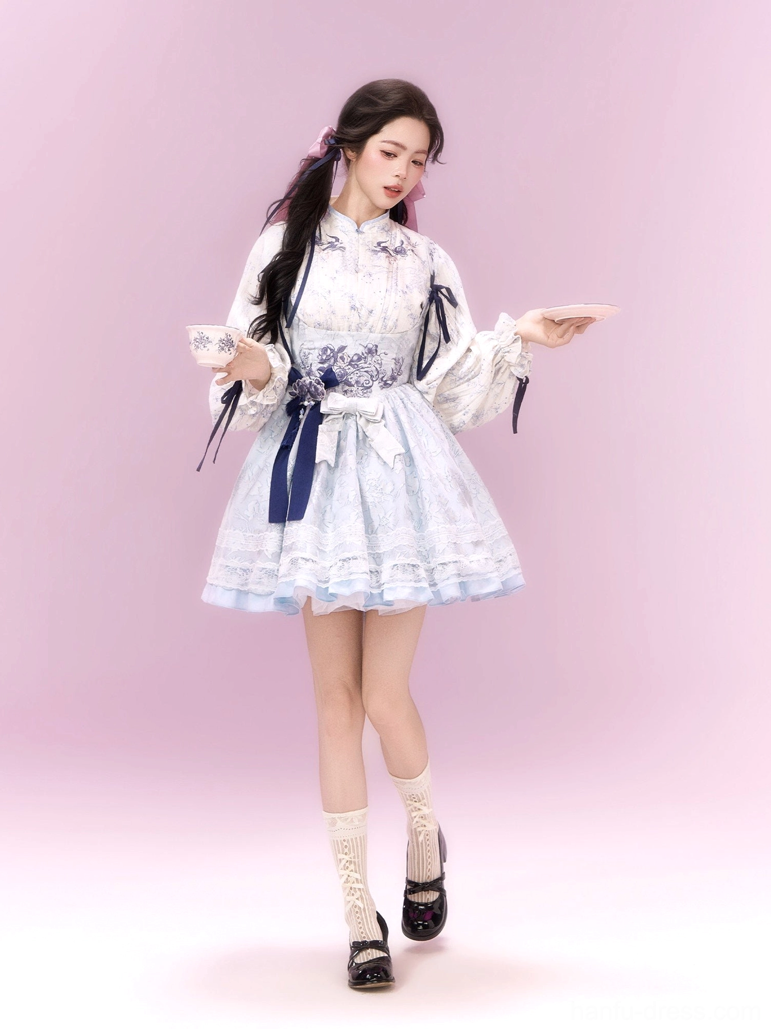 Light blue modern Hanfu xianxia Lolita dress set shown in motion with layered skirt, soft colors, and elegant fantasy styling