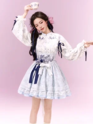 Light blue modern Hanfu xianxia Lolita dress set with printed Mandarin collar blouse, layered ruffle skirt, navy sashes, and embroidery