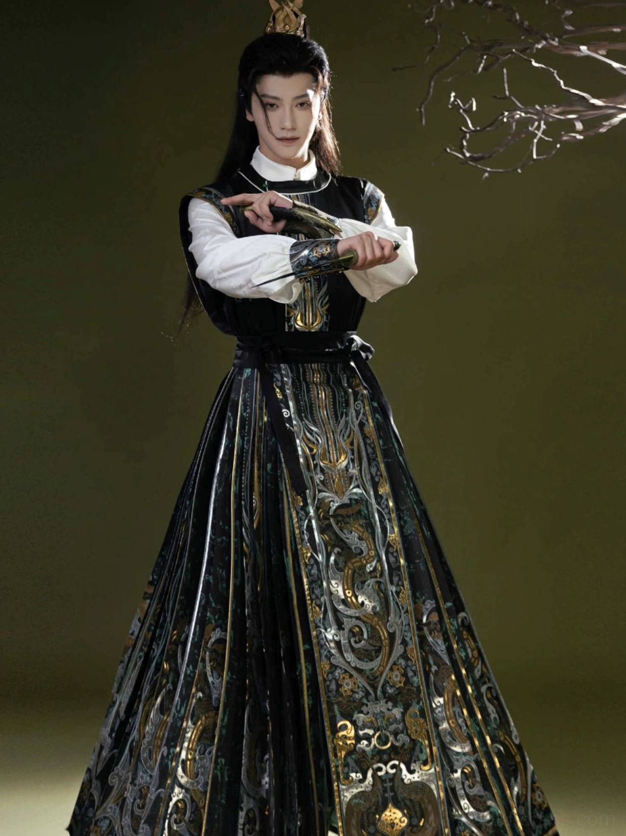 Front full body view of men’s neo-Chinese Hanfu outfit with embroidered black vest and long Ming style mamian skirt
