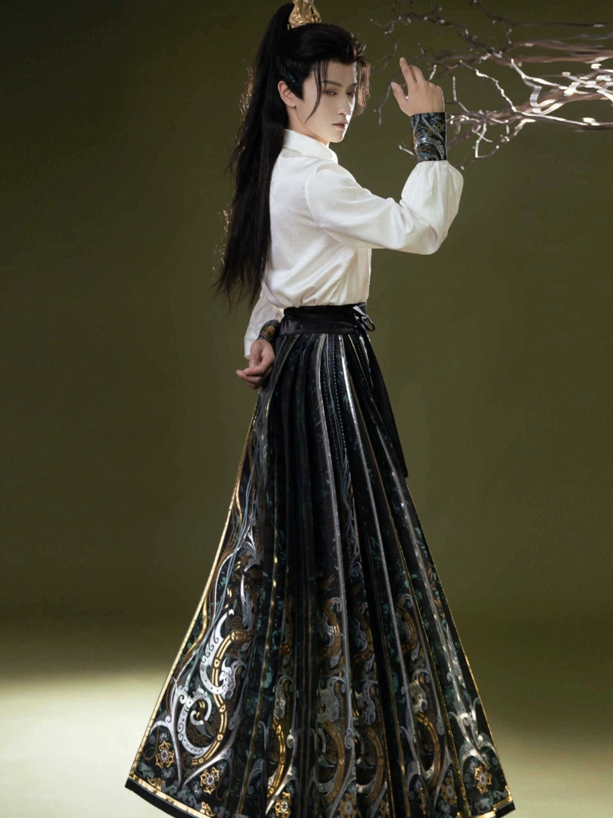 Back view of Light City gender neutral modern Hanfu showing the flowing embroidered horse face skirt silhouette