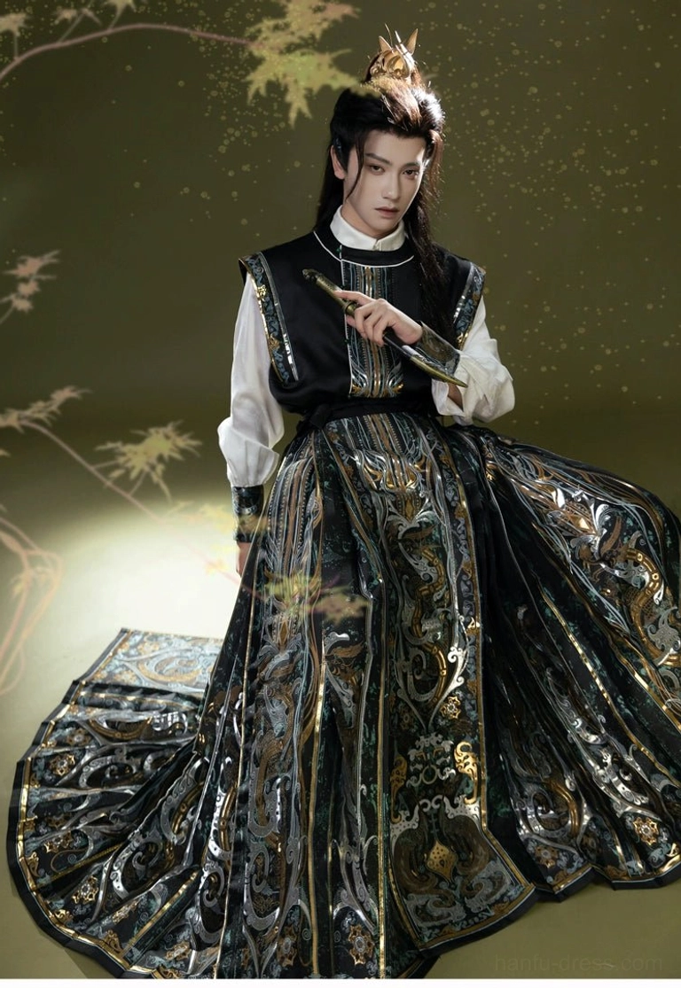 Male model wearing Light City modern Hanfu with black embroidered vest, white collar shirt and gold patterned mamianqun horse face skirt