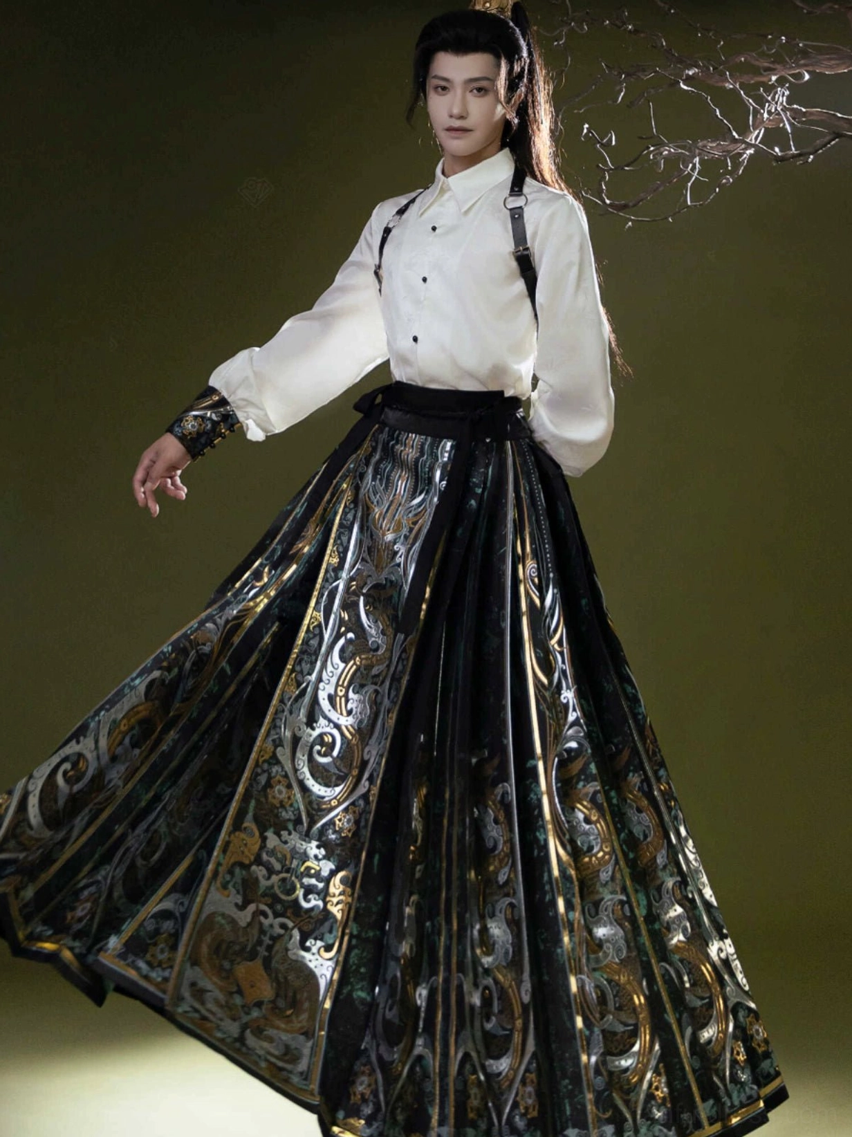 Side full body view of white stand collar Hanfu shirt styled with a long embroidered mamianqun horse face skirt