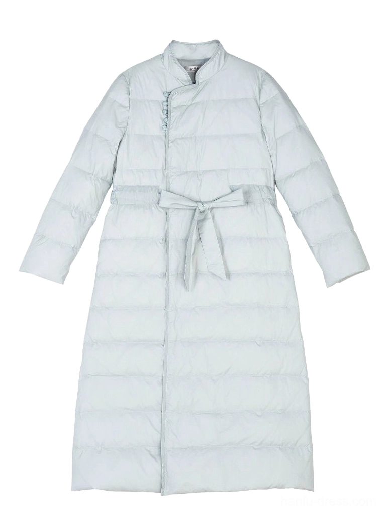 Flat lay front view of a light dusty blue women's over knee Chinese style down coat with oblique stand collar frog buttons detachable waist sash and quilted panels