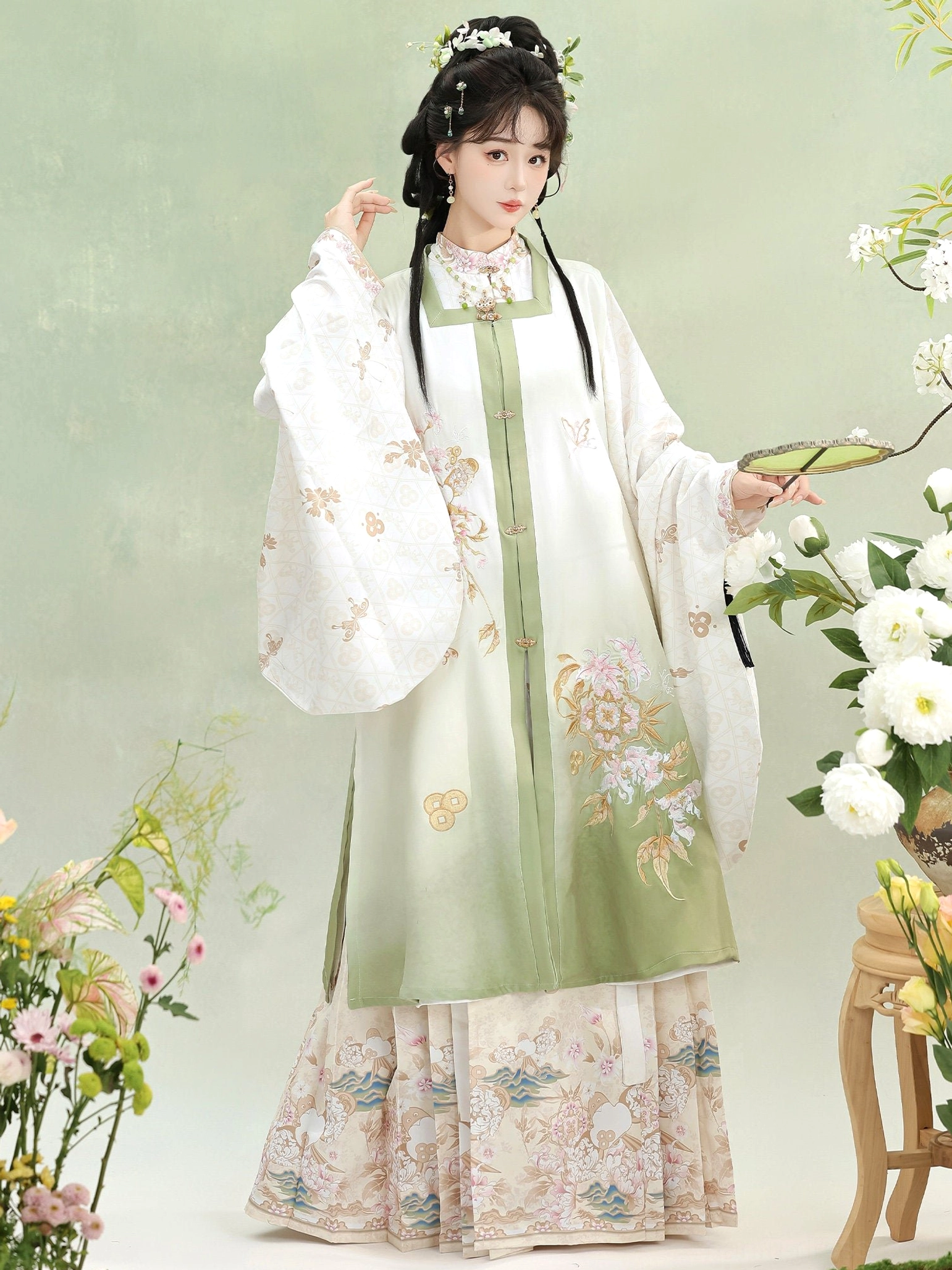 Light green Ming Dynasty Hanfu set with square collar vest wide sleeves and coordinated printed mamian skirt