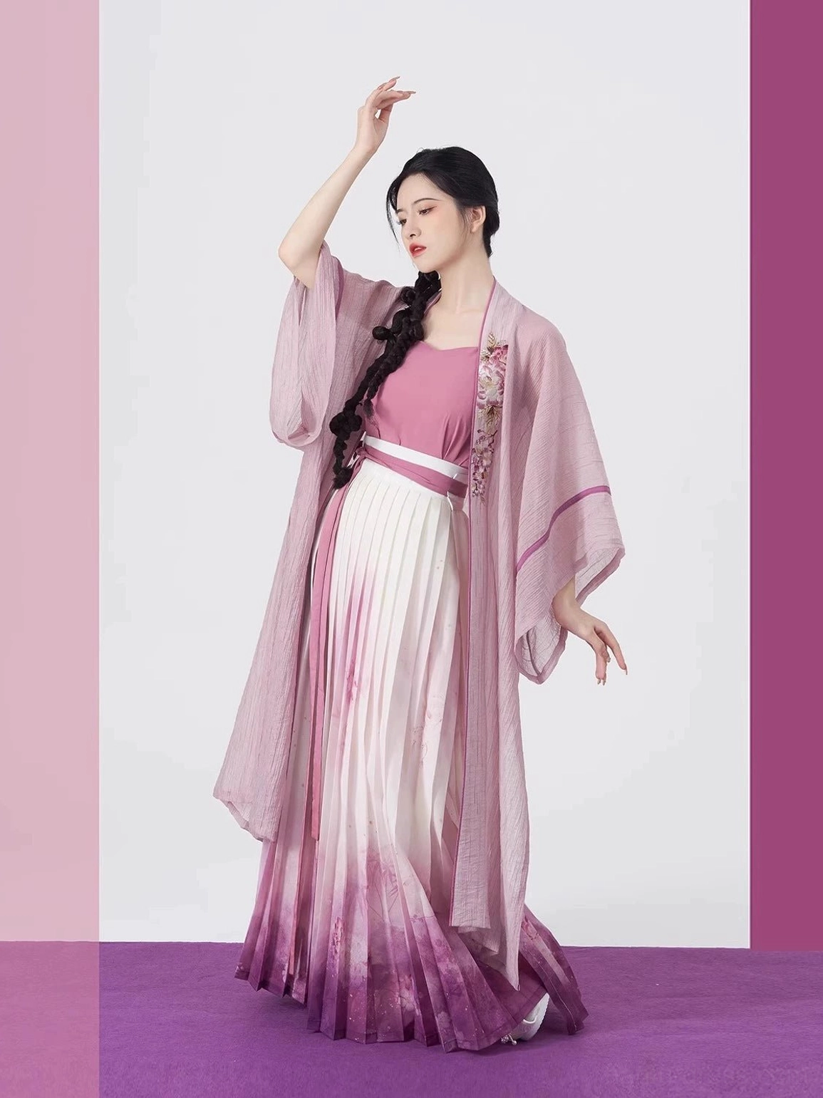 Light lavender pink modern Song Dynasty hanfu outfit in a dynamic dance pose with flowing beizi and pleated gradient skirt