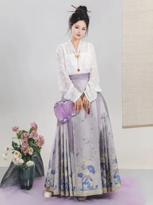 Light purple Ming Dynasty inspired floral mamianqun horse face skirt styled with a white cross-collar Hanfu blouse, full front view