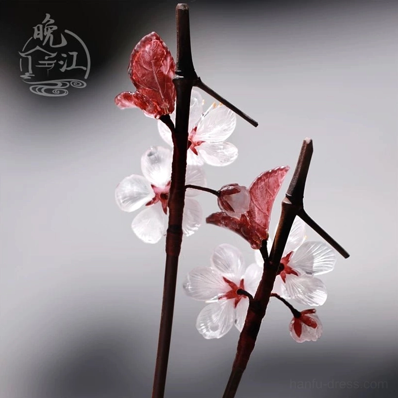 Front view of single Lihua plum blossom Chinese hair stick with clustered white blossoms, reddish buds, dark red leaves, and natural branch-inspired stem