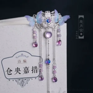Lilac butterfly Hanfu hair accessory displayed on a vintage Chinese poetry book with a central purple gemstone and layered metal tassel chains
