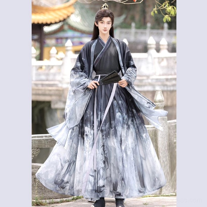 Back three-quarter view of black and grey men’s Xianxia hanfu full set with wide sleeve ink-wash dragon print robe and lavender waist sash