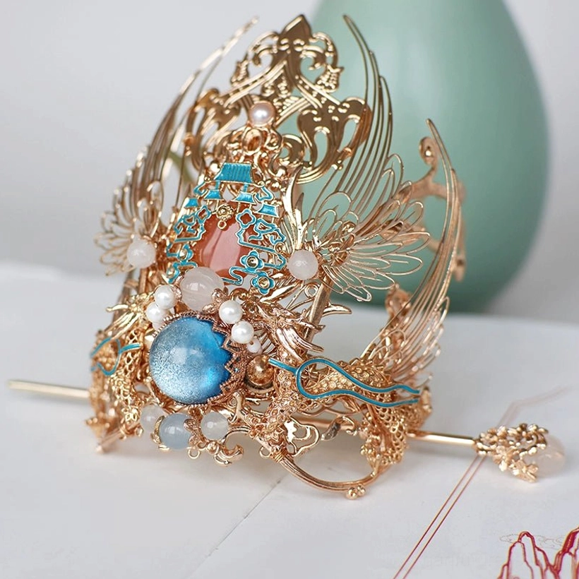 Front view of ornate Linjiang Fairy Chinese style hair crown with layered openwork blue stones and pearl accents