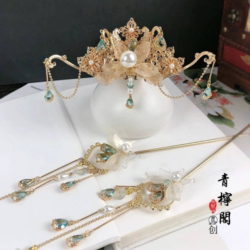 Amethyst Linyu Hanfu hair accessory set with gold-tone floral crown, pearl centerpiece, green-blue tassel pendants and matching hairpins flat lay