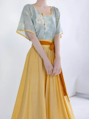Dusty blue little chrysanthemum Song Dynasty Hanfu short sleeve top with golden yellow high waisted flowing skirt front view