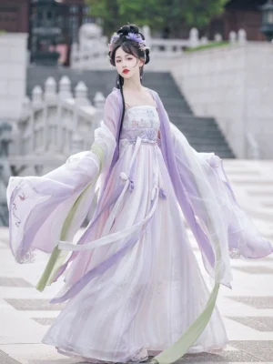 Purple Tang Dynasty Heziqun Hanfu dress side view showing flowing wide sleeves, pale green pibo sash, and long decorative ribbons
