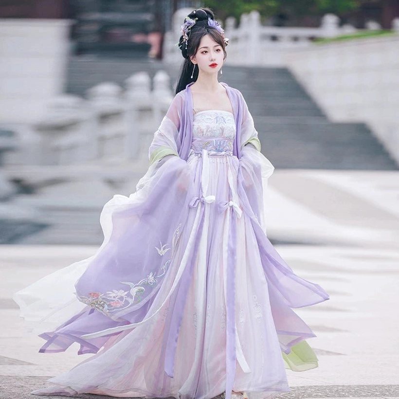 Little Grape purple Tang Dynasty Heziqun Hanfu complete set back three-quarter view showing embroidered skirt, outer coat, and slim waist silhouette