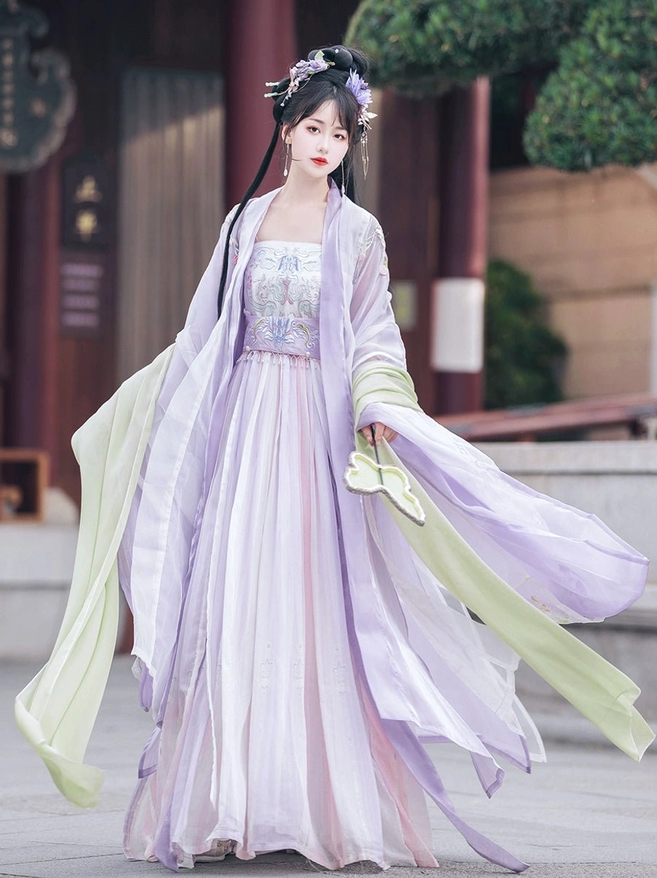Purple Tang Dynasty style Hanfu Heziqun complete outfit with embroidered bandeau bodice, wide sleeves, green sash, and folding fan