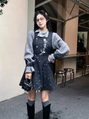 Little Luck modern Hanfu fitted grey wool blend midi dress shown from the front in an outdoor cafe setting