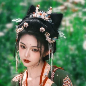 Model wearing the complete Little Rabbit Fairy Chinese Hanfu hair accessory set with cat ear inspired buns, floral hairpins, long tassels, pearls, and cloisonne style ornaments