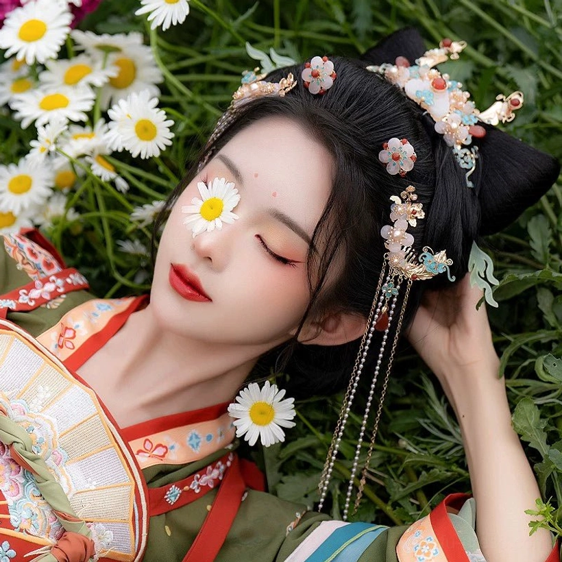 Model wearing the full Little Rabbit Fairy Chinese Hanfu hair accessory set with cat ear inspired buns, flower clips, long chain tassels, pearls, and blue cloisonne details