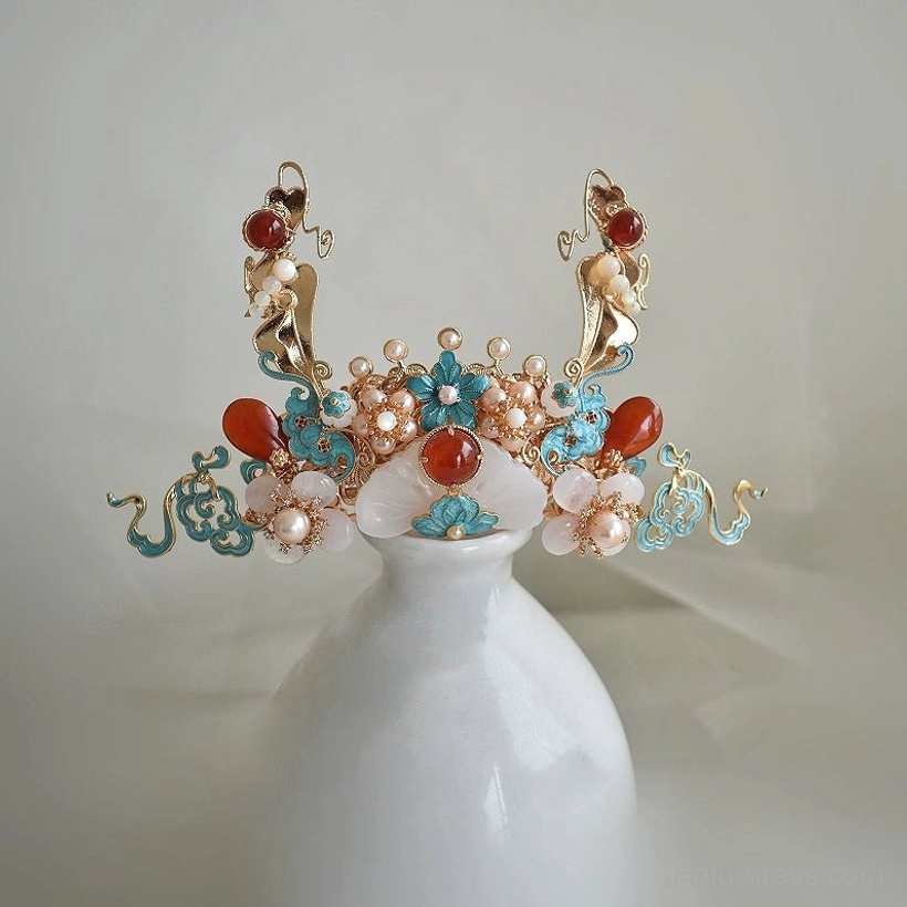 Central Chinese Hanfu hair crown with flying apsara ornaments, blue cloisonne style cloud details, red accents, white pearls, and gold tone metal frame