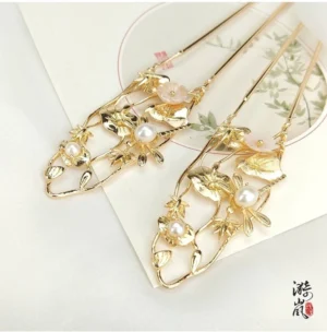 Lixia gold floral double-prong Hanfu hairpins with pink flowers and faux pearl branch details on Chinese style stationery