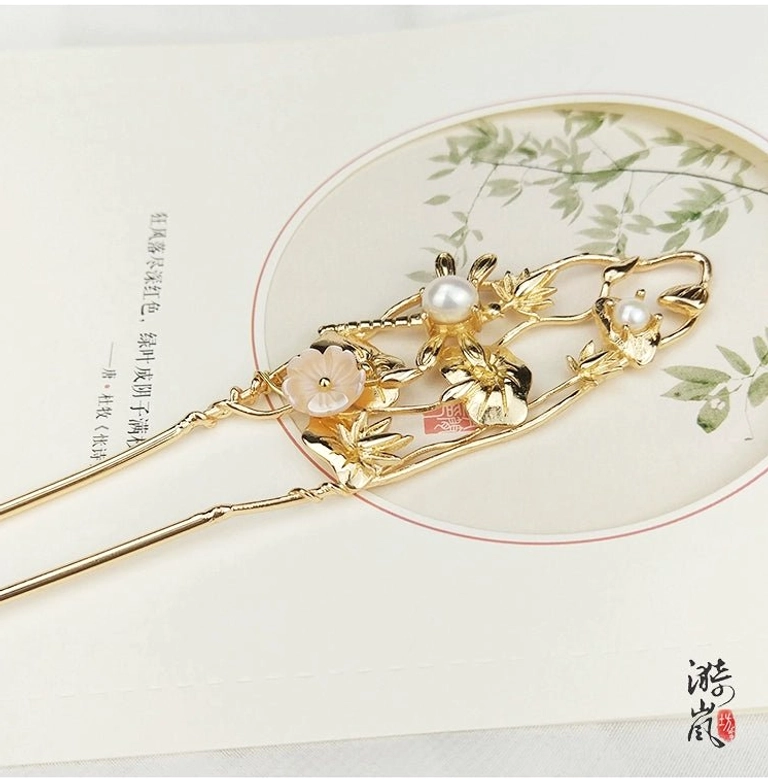 Front view of Lixia vintage Chinese style gold floral Hanfu hairpin with long double pins, pearl and pink flower accents