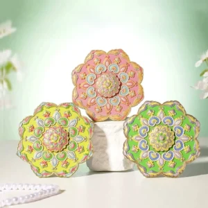 Pink yellow and green lotus mandala Chinese pocket mirrors displayed with pearls and white flowers