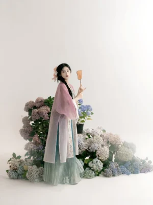 Side view of Lotus Pond Song Dynasty Hanfu set with pastel qiyao ruqun pleated skirt, translucent beizi jacket, flower hair ornament, and wooden fan